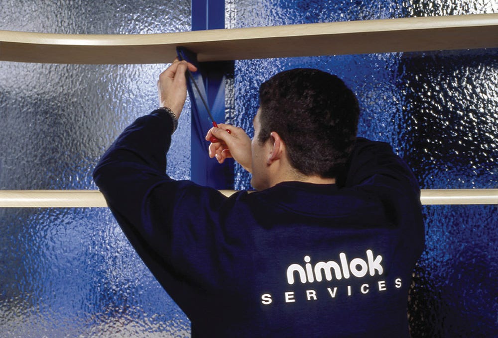 Nimlok trade show booth being installed