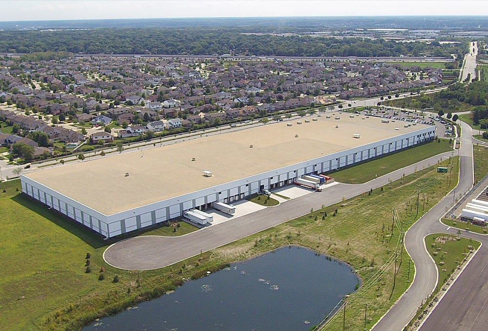 Trucks transporting trade show booths from warehouse 