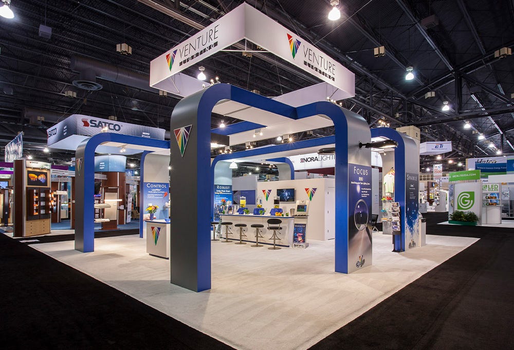 Spacious custom trade show exhibit with integrated lighting products